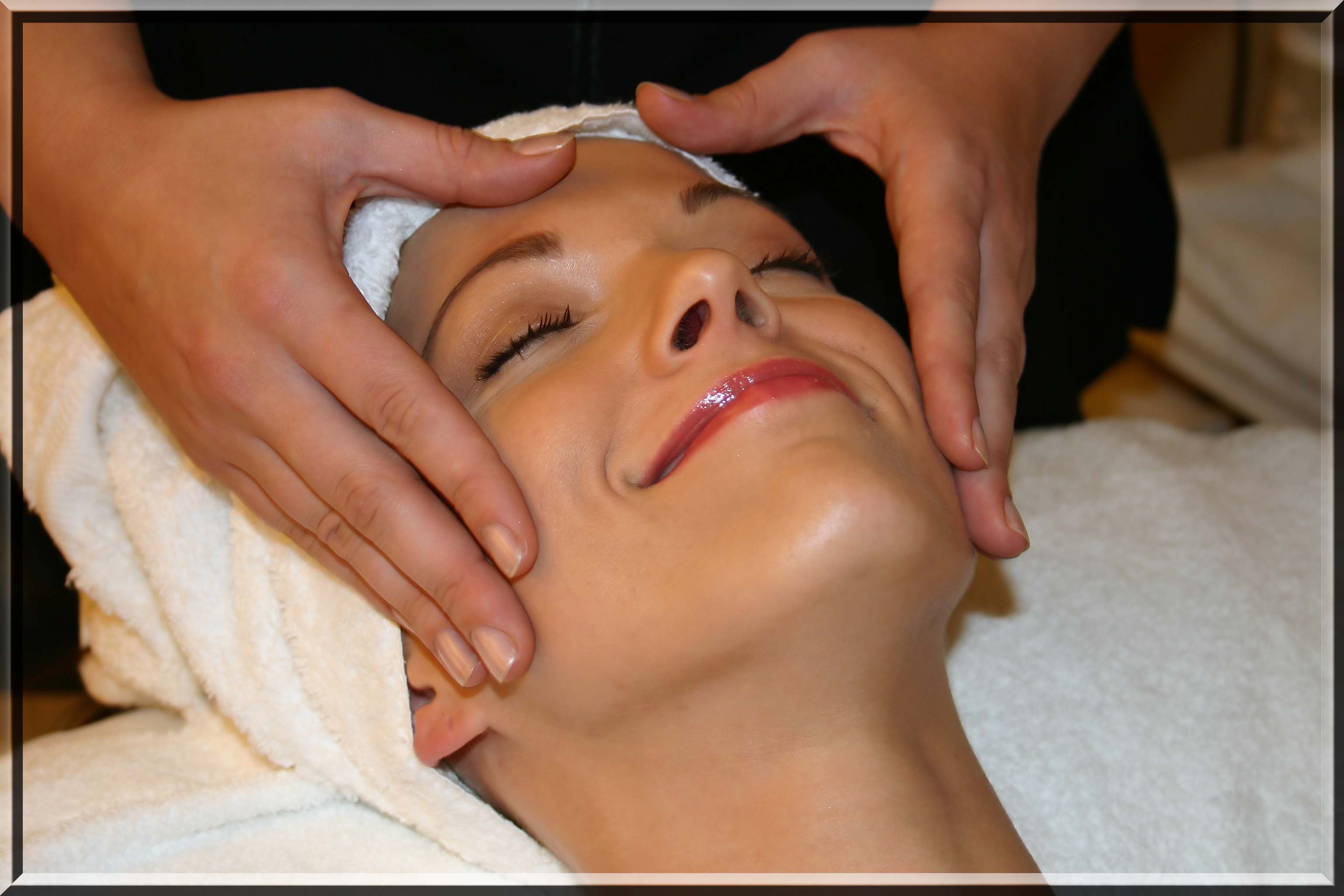 Woman getting a facial massage Stormking Spa womens spa packages