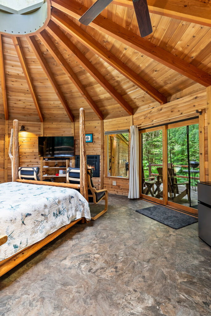 Bear Cabin bedroom with fireplace photo 2